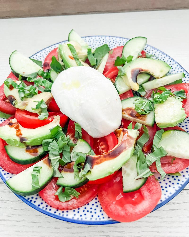 Burrata cheese with tomatoes and basil