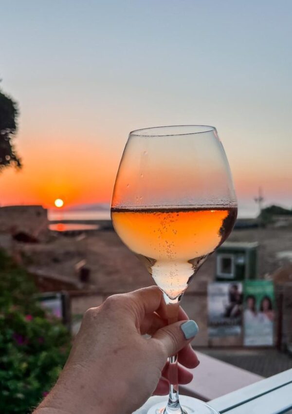 Oinoa Restaurant sparkling wine and sunset