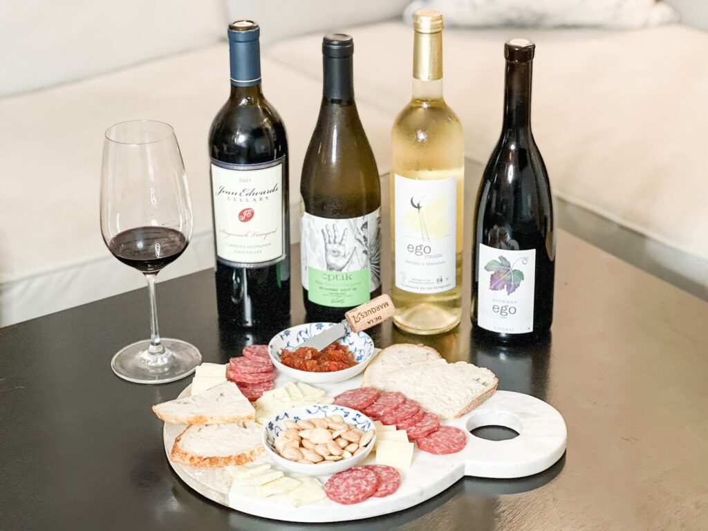 The California Wine Club Review red and white wine and charcuterie board