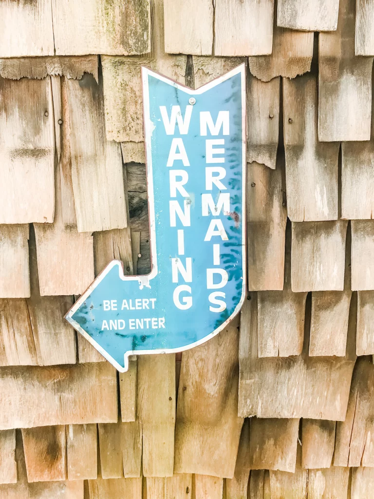 Cape Code Winery mermaids warning sign