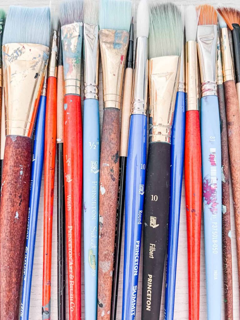 Row of colorful paint brushes