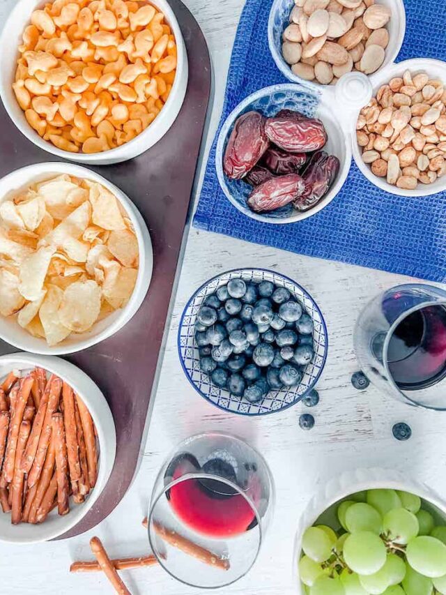 Snacks with wine on a table feature