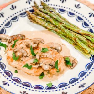 Chicken Marsala and asparagus on a plate