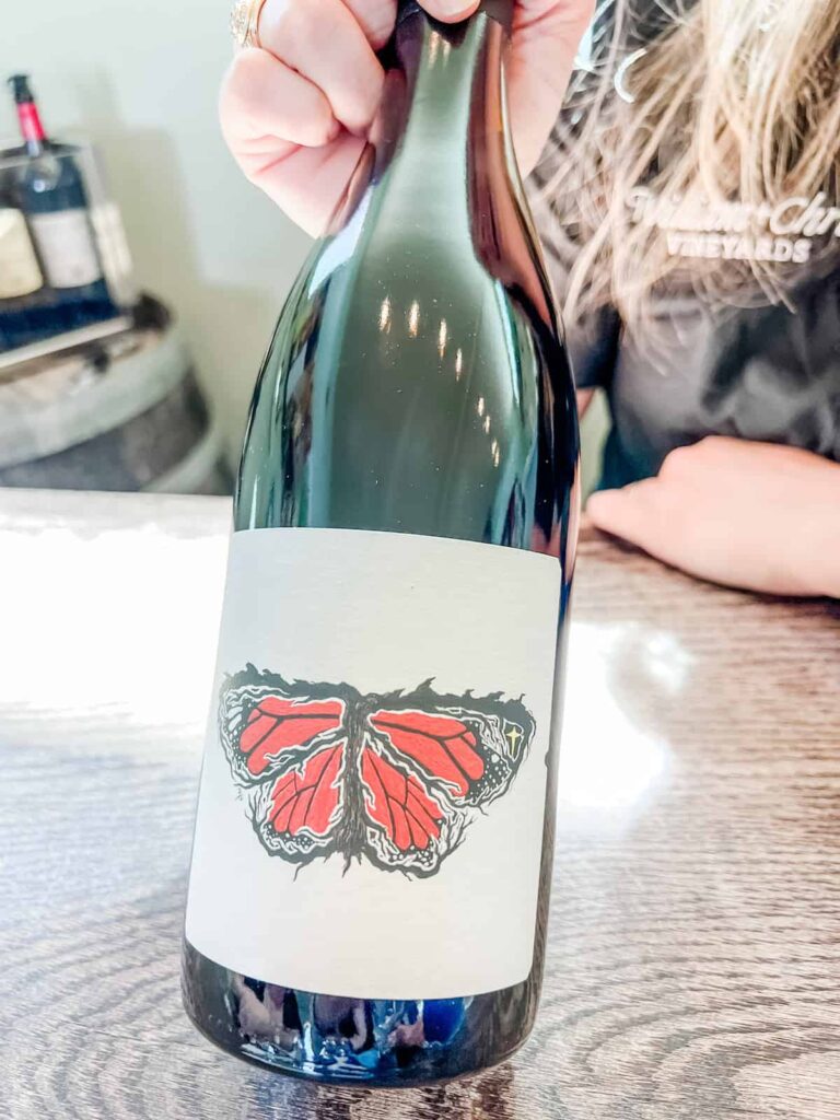 William Chris Vineyards Artist Blend wine bottle with butterfly artwork
