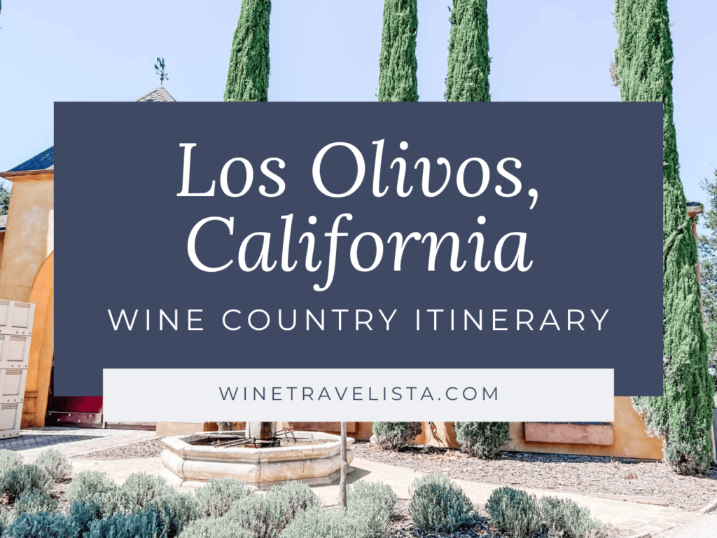 Cover for a Los Olivos, California Wine Country Itinerary by Wine Travelista, featuring a yellow winery building surrounded by tall cypress trees in the background.