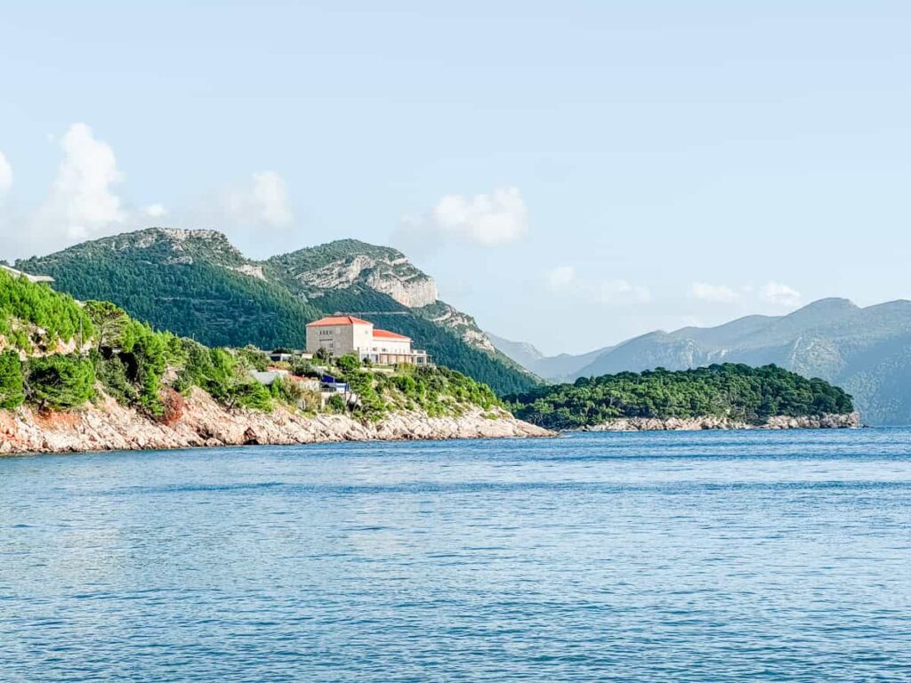 Coastal view of Grgić Vina set along the rocky shoreline of the Pelješac Peninsula.