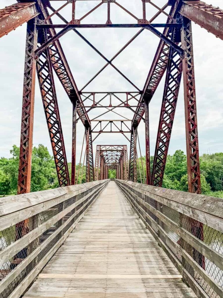Historic steel truss bridge along the Riverwalk Trail in Danville's River District.